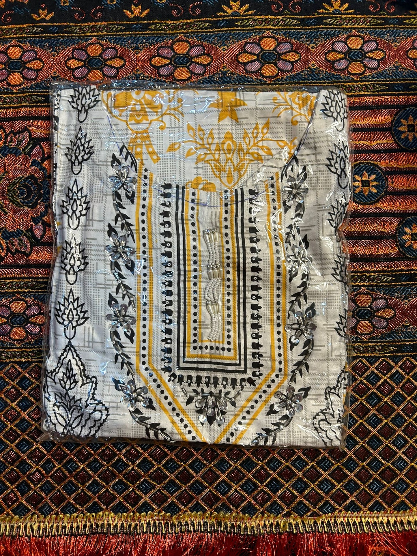 White Cotton Shalwar Kameez with Coloured Tribal Embroidery